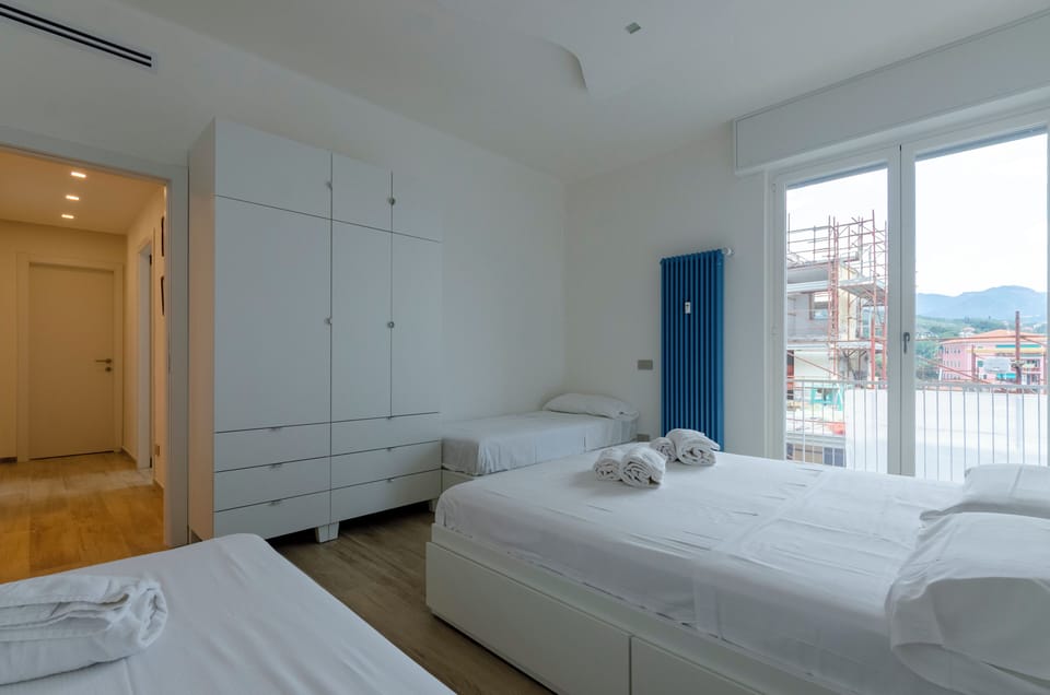 Apartment, 2 Bedrooms, Balcony, Partial Sea View | Iron/ironing board, free WiFi, bed sheets