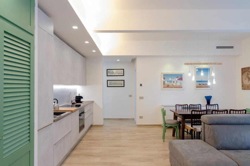 Comfort Apartment, City View | Living area | Flat-screen TV