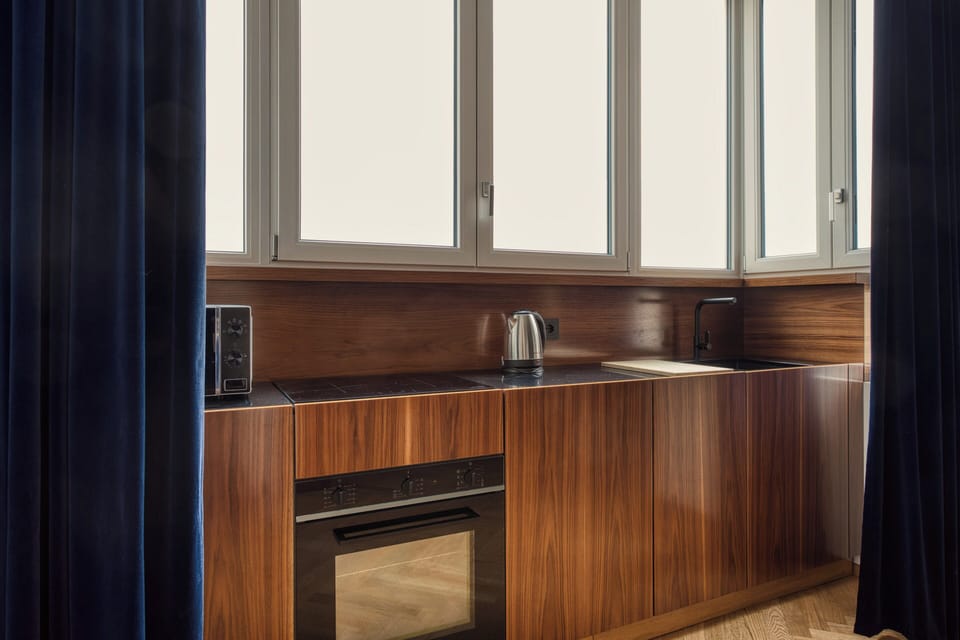 Apartment, 1 Double Bed with Sofa bed | Private kitchen | Espresso maker, electric kettle, dining tables