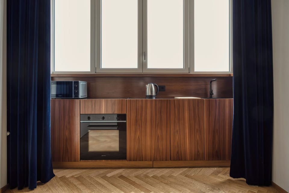 Apartment, 1 Double Bed with Sofa bed | Private kitchen | Espresso maker, electric kettle, dining tables