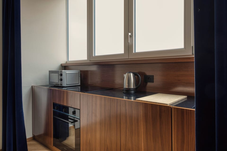 Apartment, 1 Double Bed with Sofa bed | Private kitchen | Espresso maker, electric kettle, dining tables