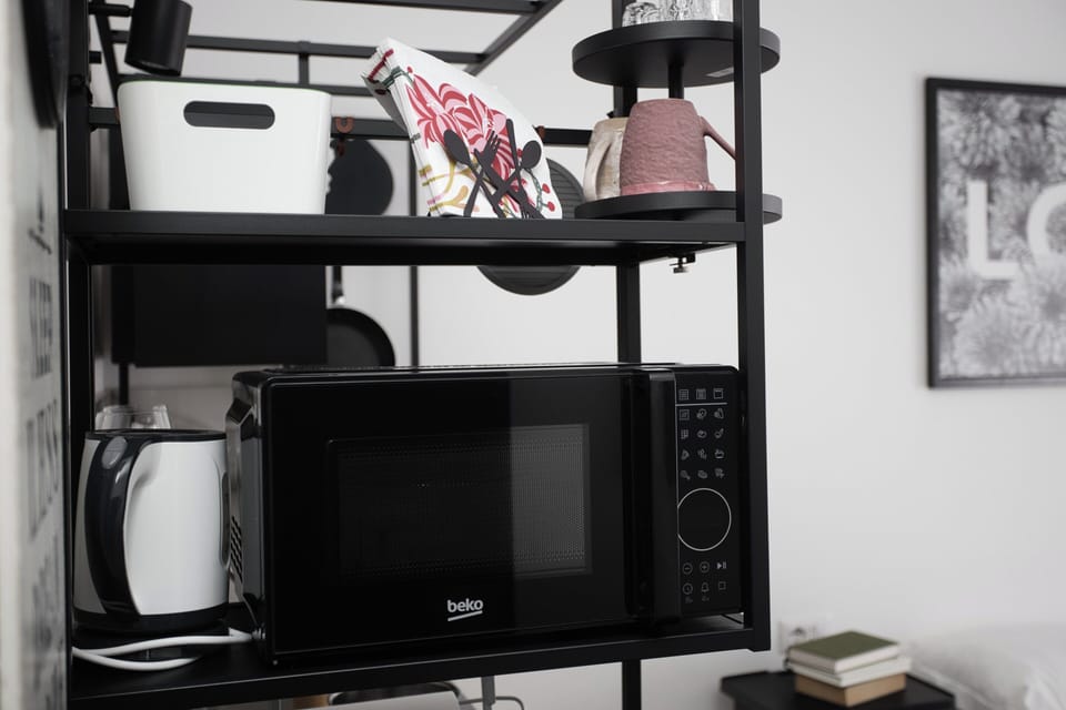 Apartment, 2 Bedrooms, 2 Bathrooms | Private kitchen | Fridge, microwave, stovetop, coffee/tea maker