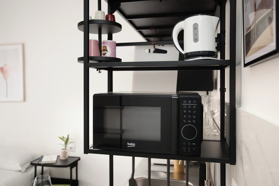 Apartment, 2 Bedrooms, 2 Bathrooms | Private kitchen | Fridge, microwave, stovetop, coffee/tea maker