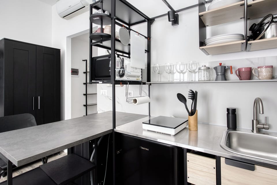 Apartment, 2 Bedrooms, 2 Bathrooms | Private kitchen | Fridge, microwave, stovetop, coffee/tea maker