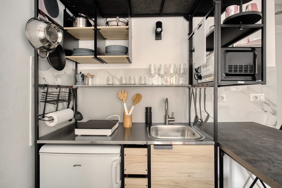Apartment, 2 Bedrooms, 2 Bathrooms | Private kitchen | Fridge, microwave, stovetop, coffee/tea maker