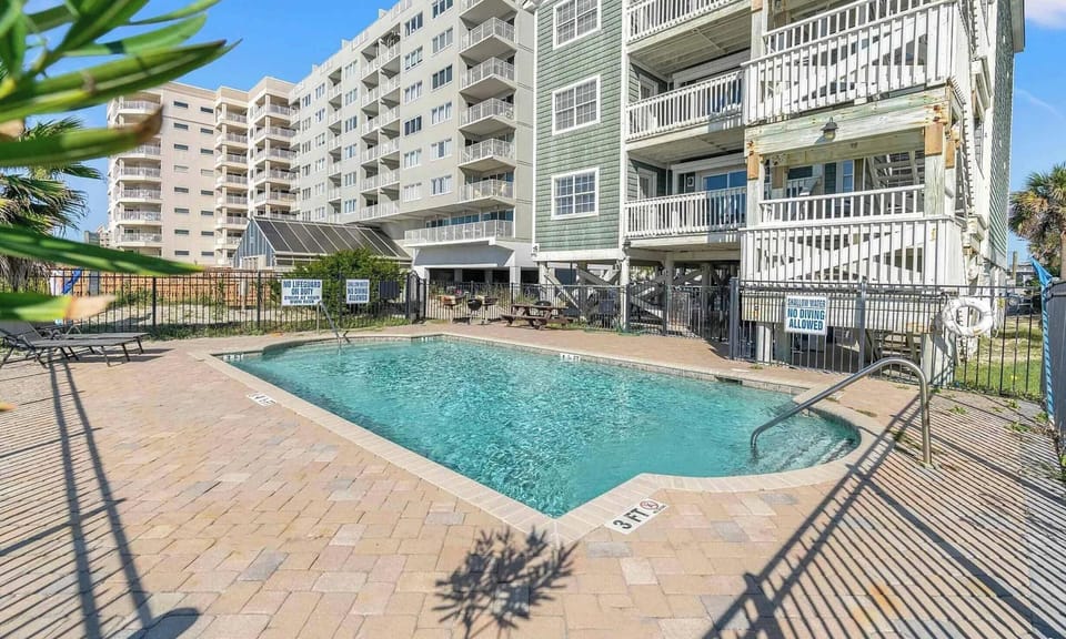 Lounge poolside under the sun and let all your stress melt away.


