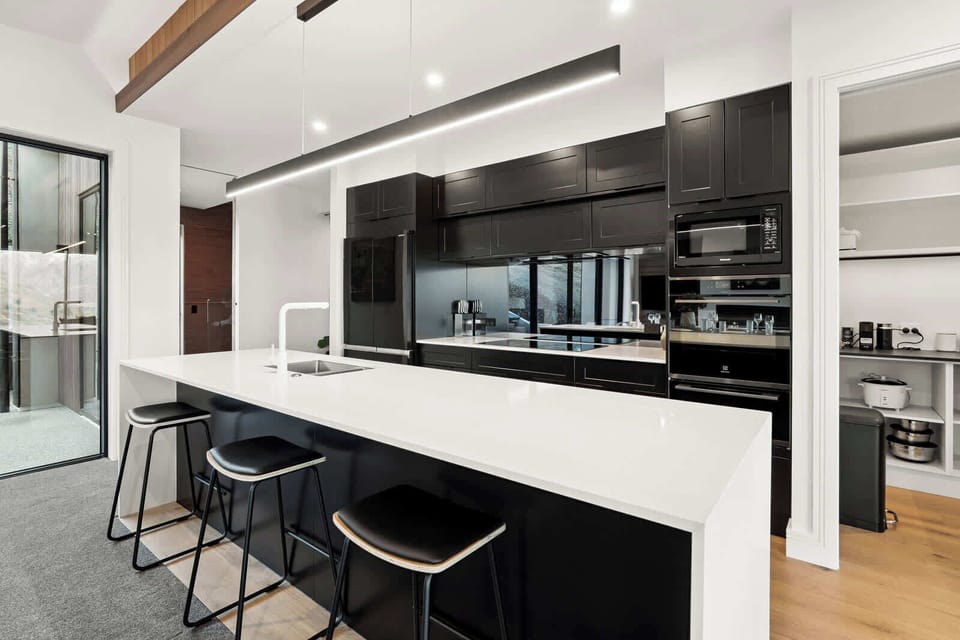 Sleek design and full amenities—ideal for cooking, gathering, and entertaining.