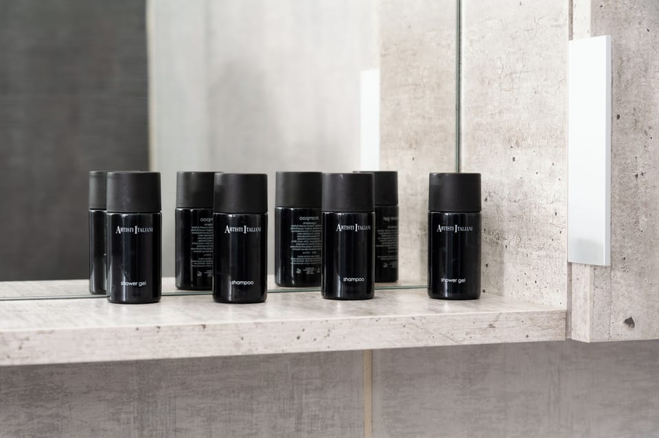 Family Quadruple Room, Balcony, Mountain View | Bathroom | Separate tub and shower, free toiletries, hair dryer, towels