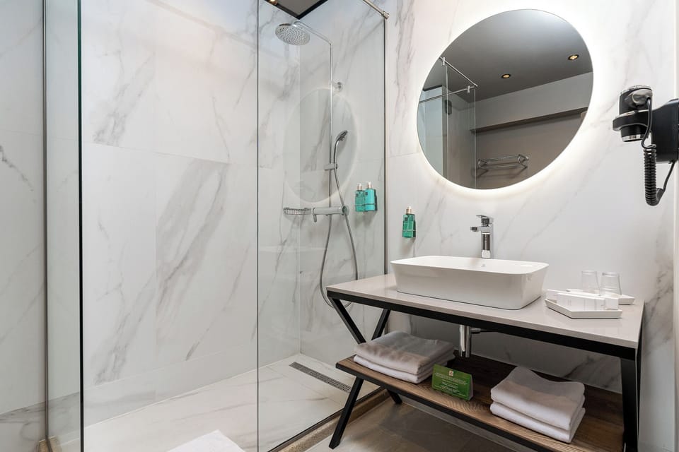 Shower, rainfall showerhead, eco-friendly toiletries, hair dryer