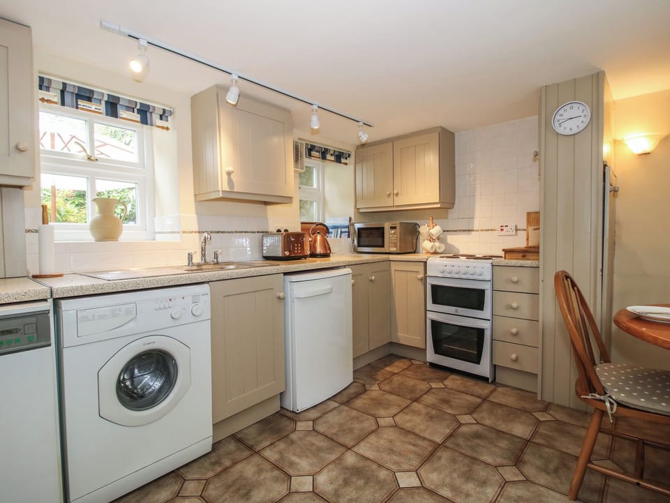 Fridge, microwave, toaster, cookware/dishes/utensils