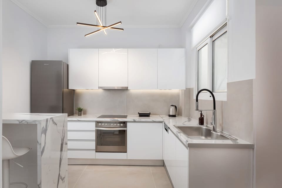 Deluxe Apartment, Balcony | Private kitchen | Full-size fridge, oven, stovetop, dishwasher