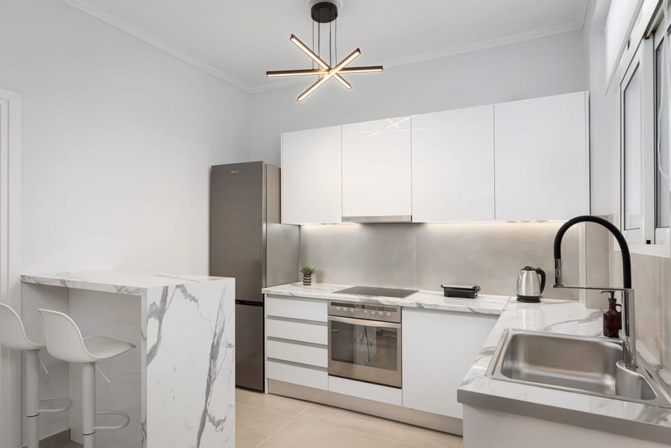 Deluxe Apartment, Balcony | Private kitchen | Full-size fridge, oven, stovetop, dishwasher