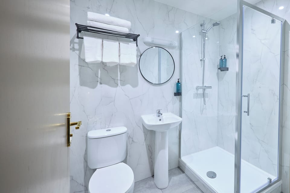 Shower, free toiletries, towels, soap