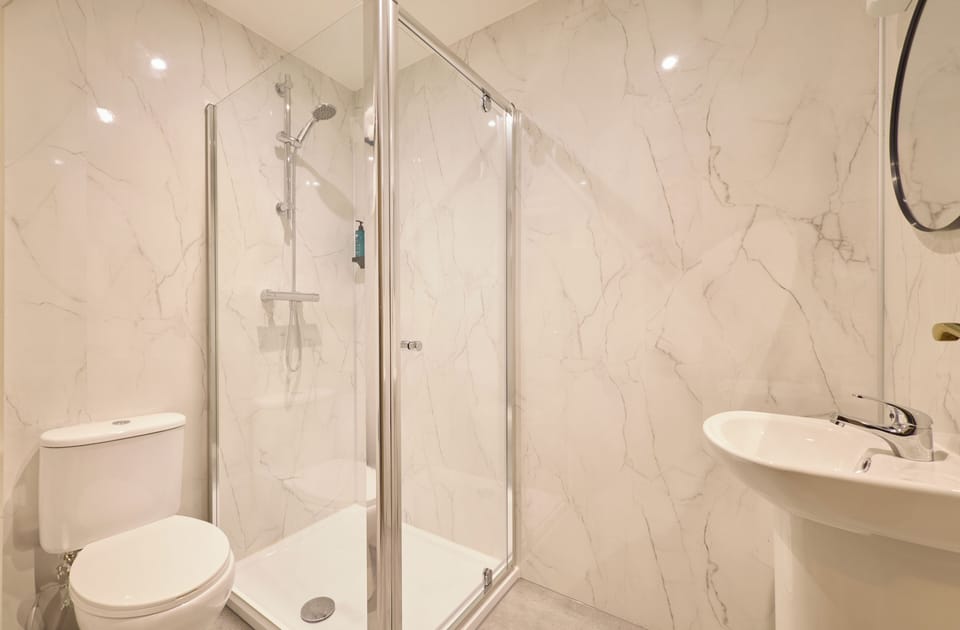 Shower, free toiletries, towels, soap