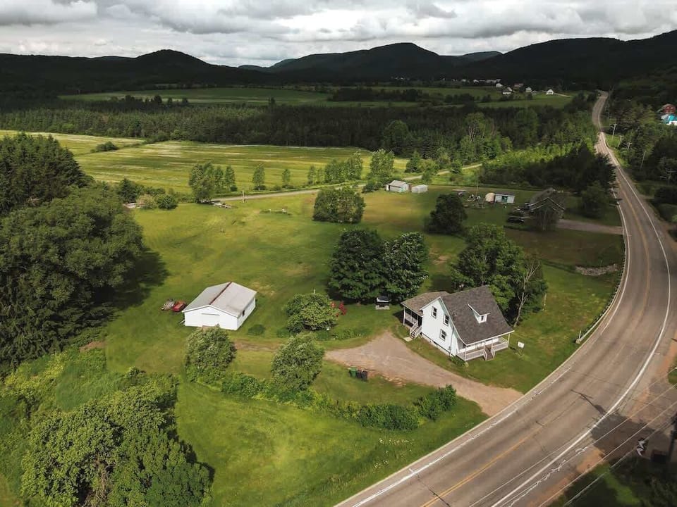 Aerial view showcasing the property nestled among nature