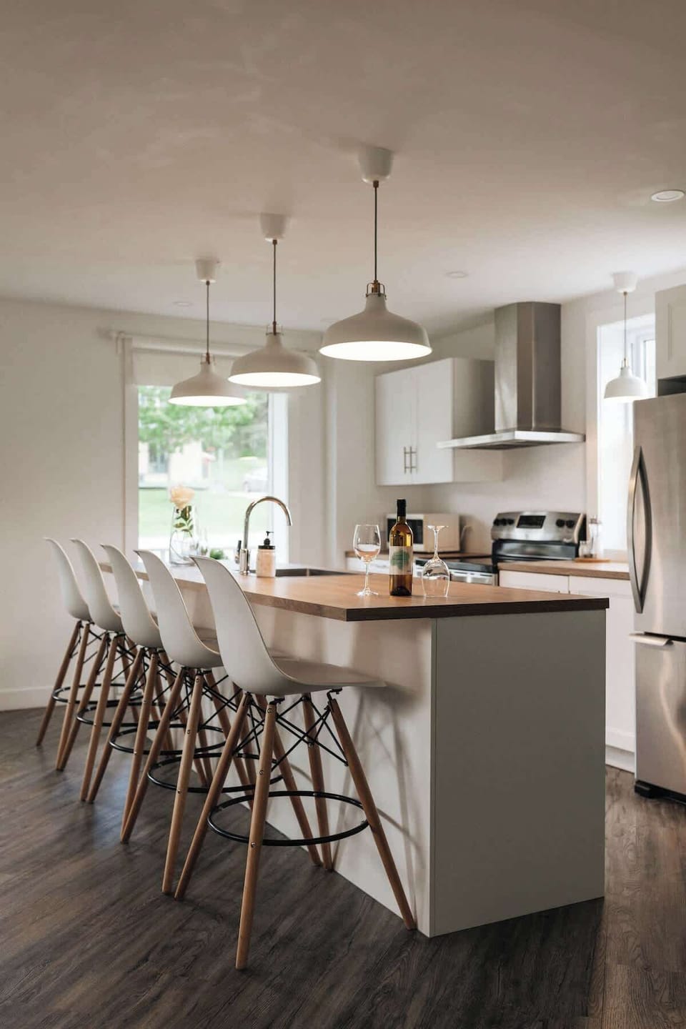 Bright, open kitchen with modern appliances and beautiful views
