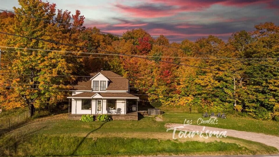 Beautiful fall colors surrounding the property, creating a picturesque scene.