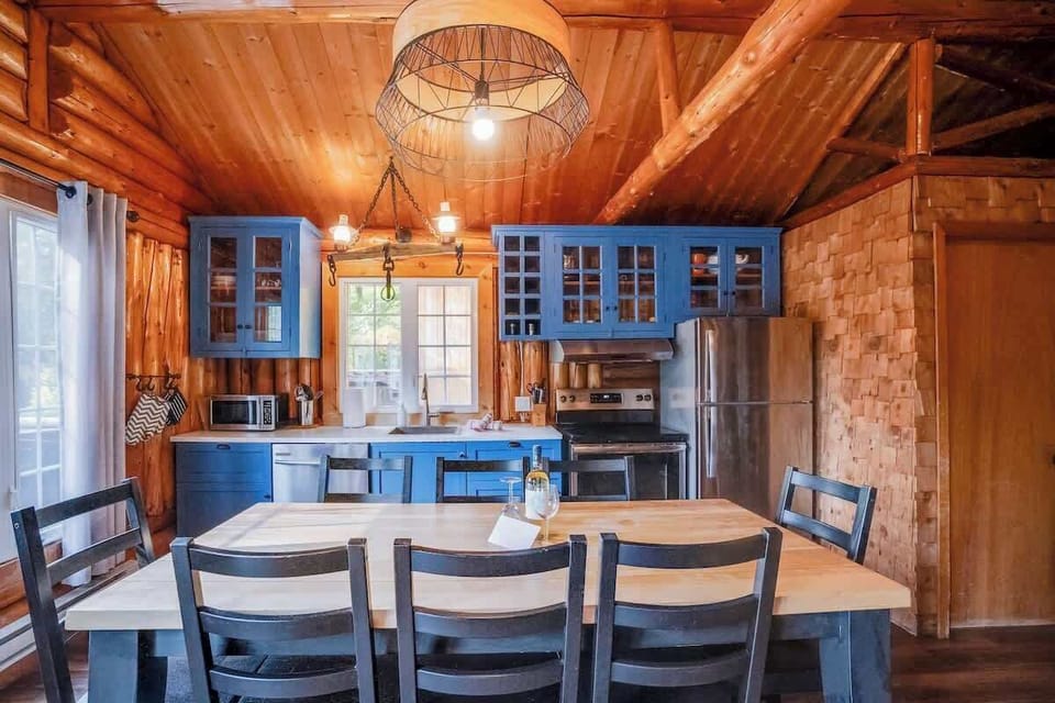 Bright kitchen with modern appliances and a stylish touch.