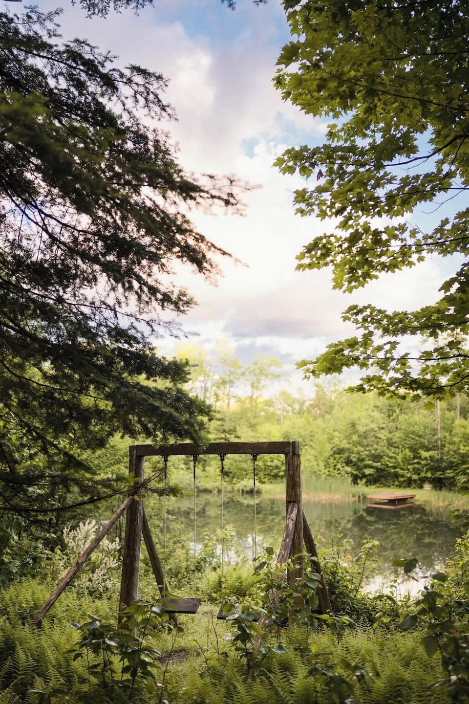 A peaceful view of the meadow with the cabin in the background, perfect for walks.