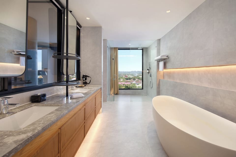 Suite, 1 King Bed | Bathroom | Free toiletries, hair dryer, slippers, bidet