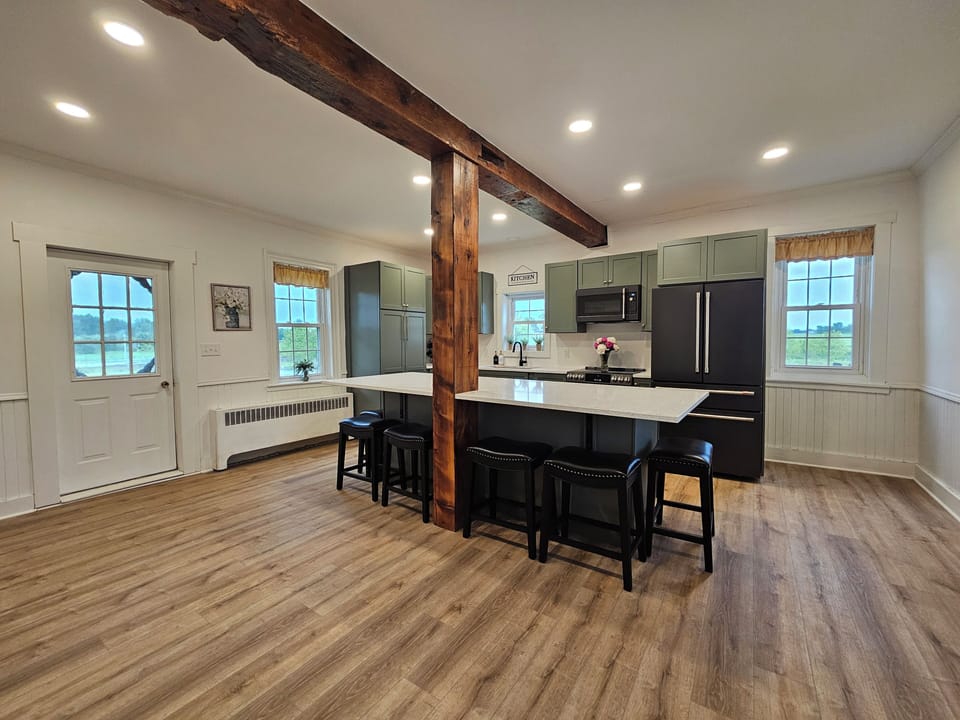 Kitchen lots of space with 6 stools