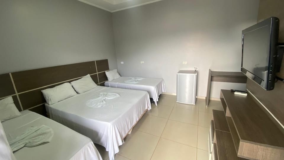 Deluxe Triple Room | Laptop workspace, iron/ironing board (on request), WiFi (free)