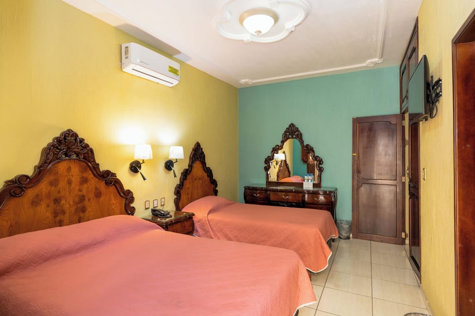 Triple Room, Private Bathroom | Iron/ironing board