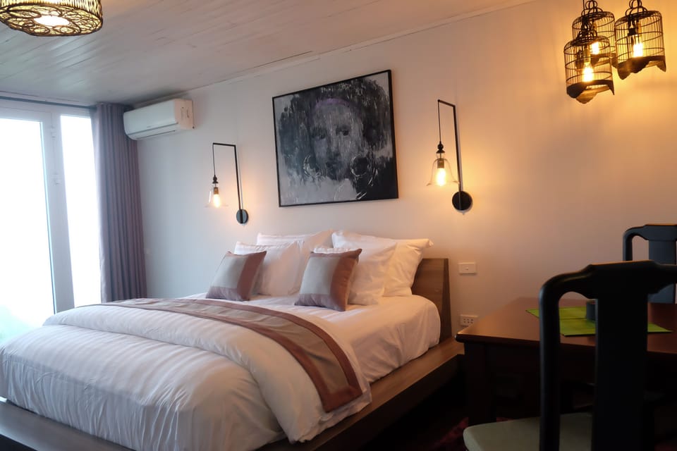 Deluxe Room, 1 King Bed, Mountain View | Minibar, in-room safe, desk, free WiFi
