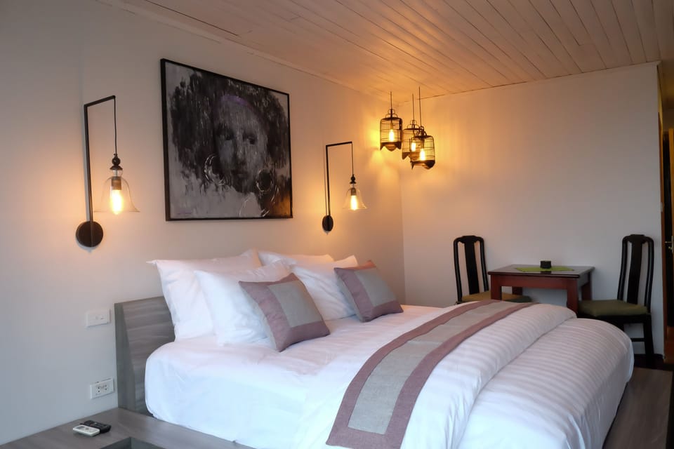 Deluxe Room, 1 King Bed, Mountain View | Minibar, in-room safe, desk, free WiFi
