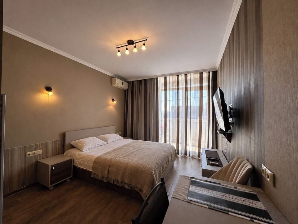 Classic Studio, Balcony, Sea View | In-room safe, laptop workspace, iron/ironing board, free WiFi