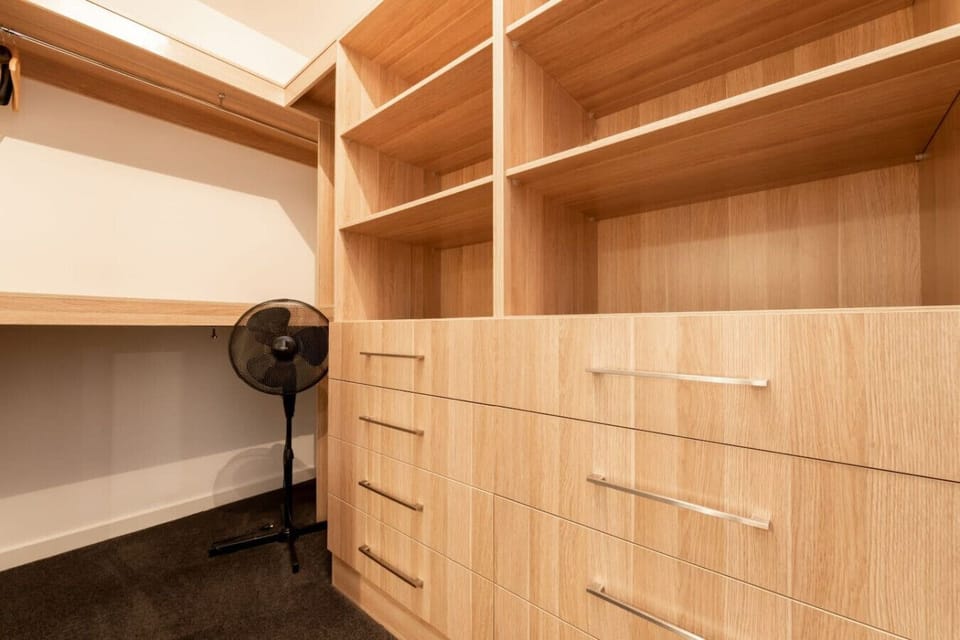Enjoy ample storage in the primary bedroom with a walk-in robe.
