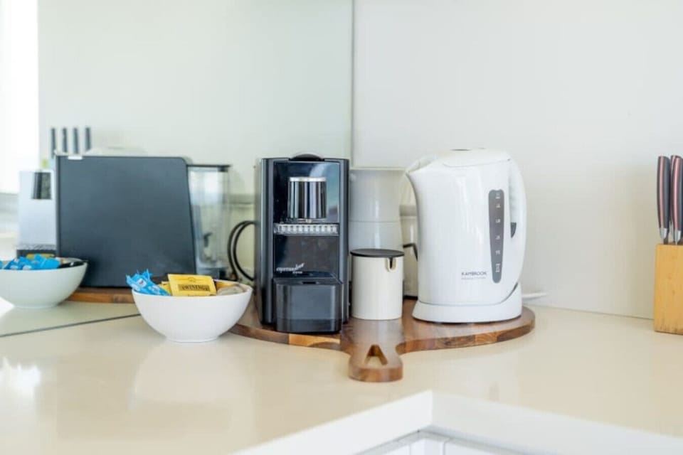 A closer look at the coffee corner, with essentials ready for your morning brew.