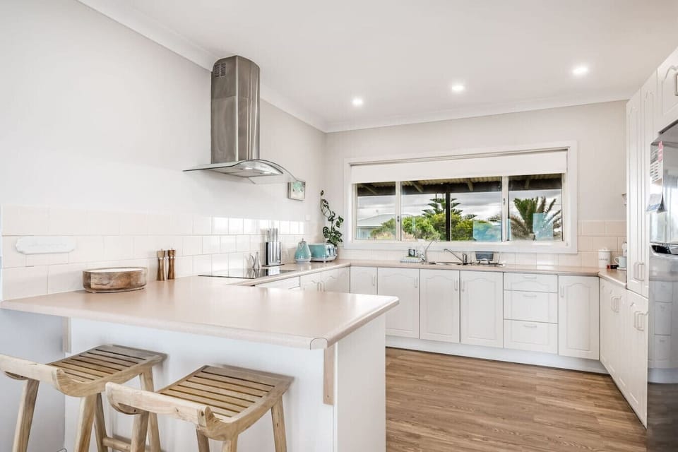 Cook with ease in the well-equipped kitchen, complete with modern appliances, ample bench space, and a bright outlook that makes every meal feel effortless.