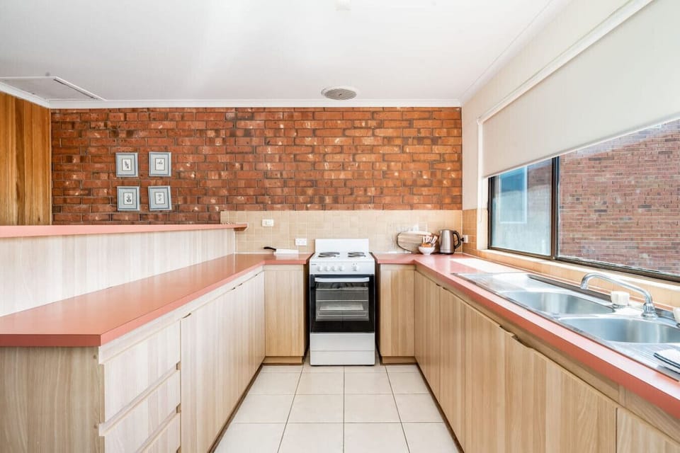 Prepare simple seaside meals in the well-kept kitchen, complete with classic finishes and all the essentials.