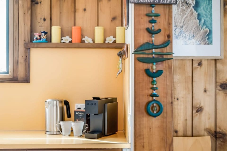 Mornings begin with coffee from the pod machine and sunlight spilling across the benchtop.