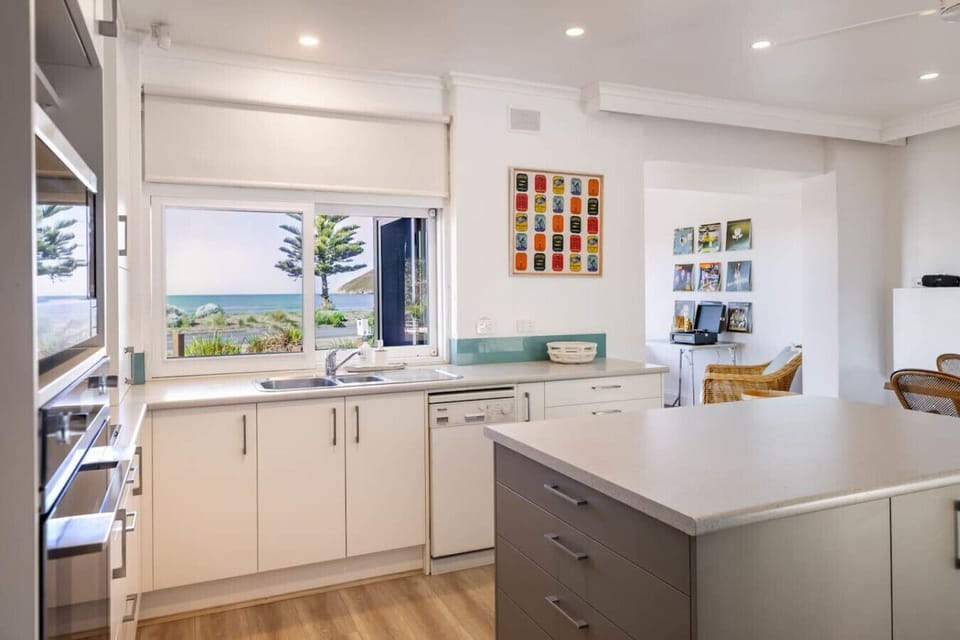 A functional coastal kitchen designed for easy holiday cooking and unhurried mornings.