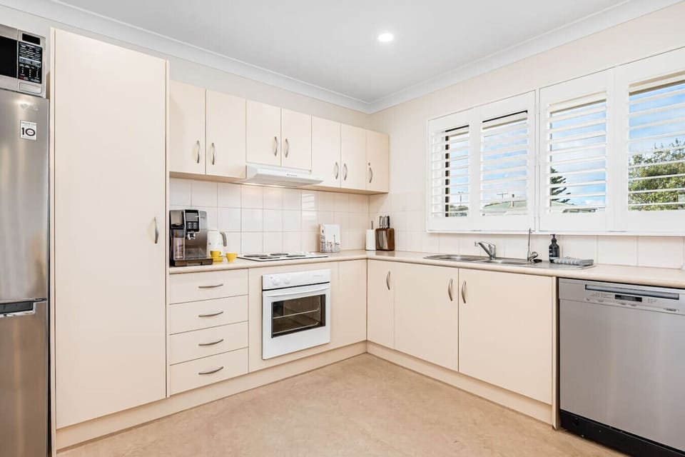 The fully-equipped kitchen ensures you have everything needed to whip up meals at home.
