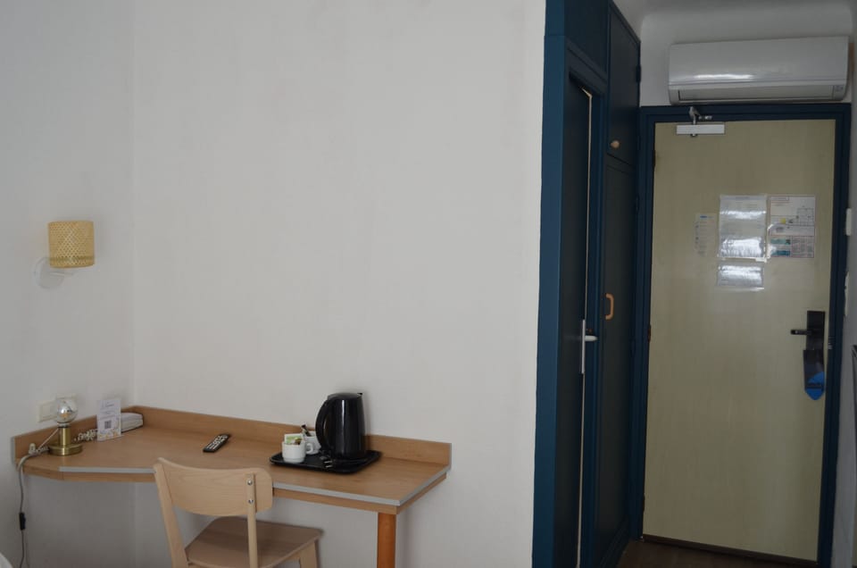 Comfort Room | Living area | 24-inch flat-screen TV with digital channels, TV