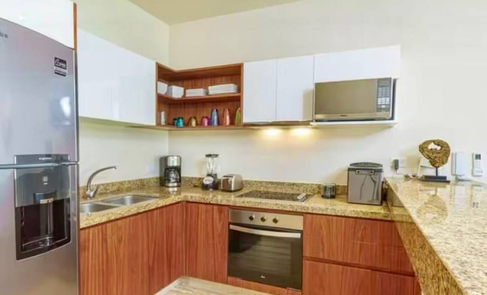 Fully stocked kitchen with ice machine and everything you need to dine in.  