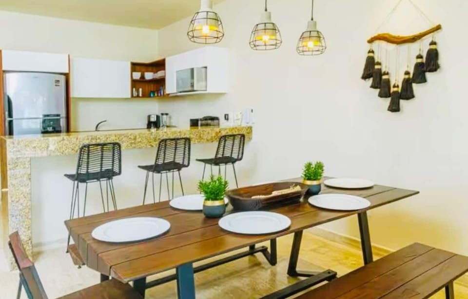 Dining room table and kitchen bar.  