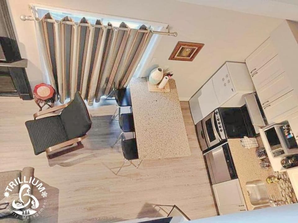 Standard Apartment, 2 Bedrooms, Balcony, Mountain View | Living area | 43-inch flat-screen TV with cable channels, fireplace