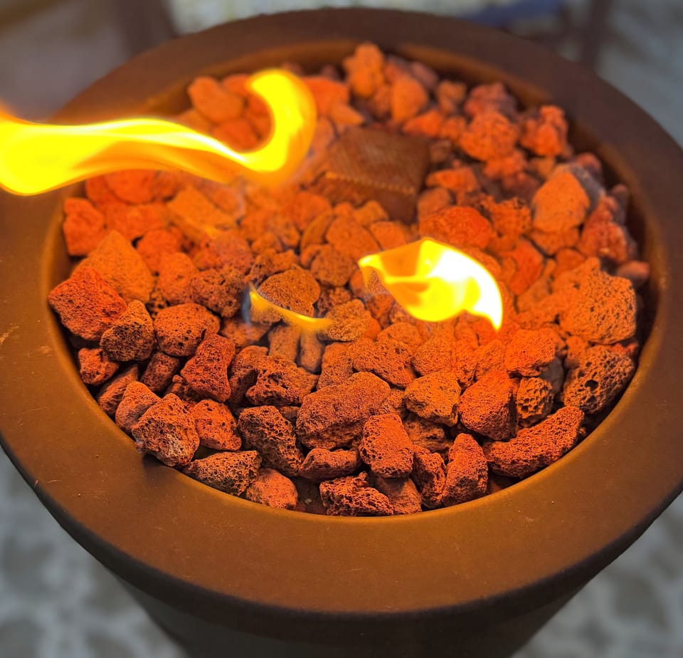 Enjoy the fire pit on the lighted patio