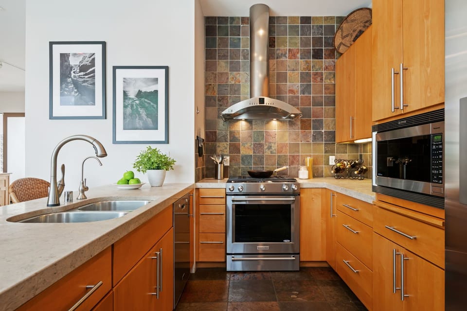 Fully equipped kitchen with stainless steel appliances