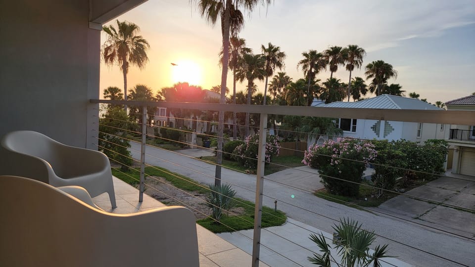 Beautiful sunset colors from your 2nd floor Queen master bedroom balcony N side