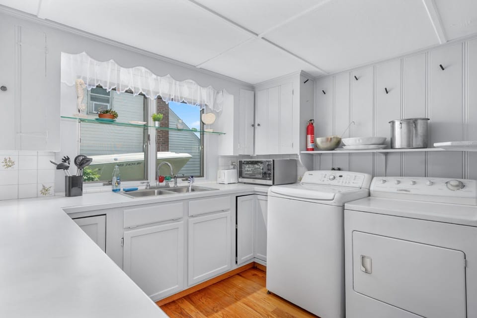 Laundry area off of kitchen
