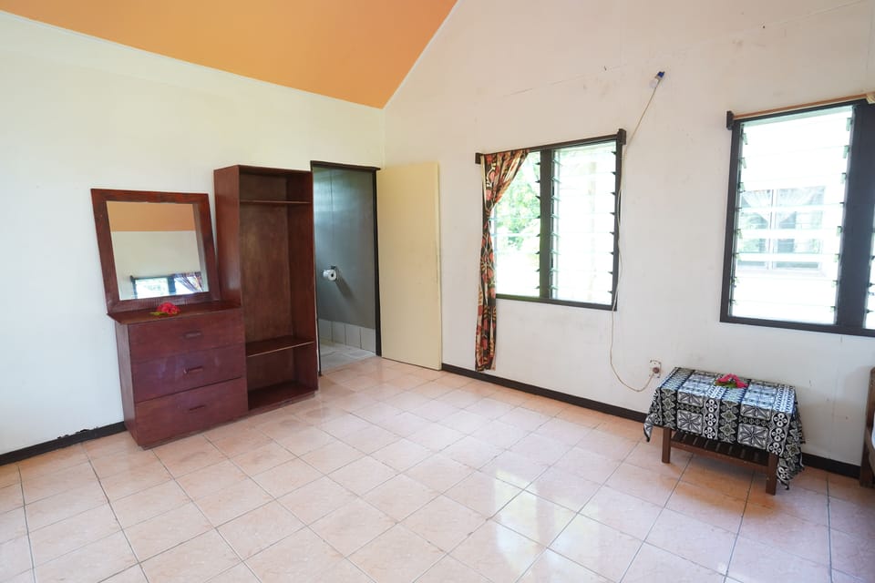 Family Triple Room, Partial Sea View | Living area