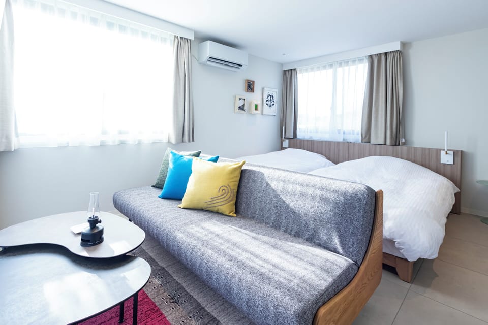 Basic Twin Room, Mountain View | Minibar (free items), in-room safe, blackout drapes, WiFi (free)
