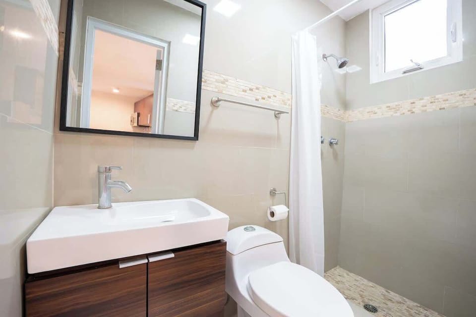 A bright bathroom with everything you need to refresh.