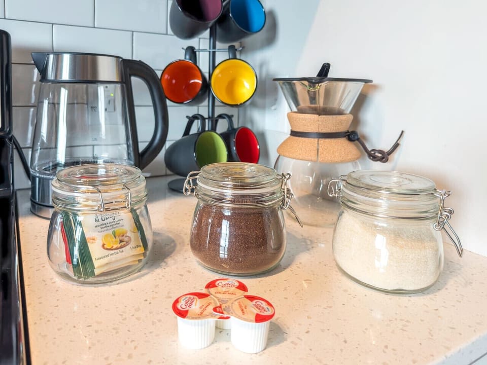 Local Brews, Perfect Mornings: Pour Over Coffee Station with Coffee, Cane Sugar, Tea, and Creamer for Your Delight! #CloudStays