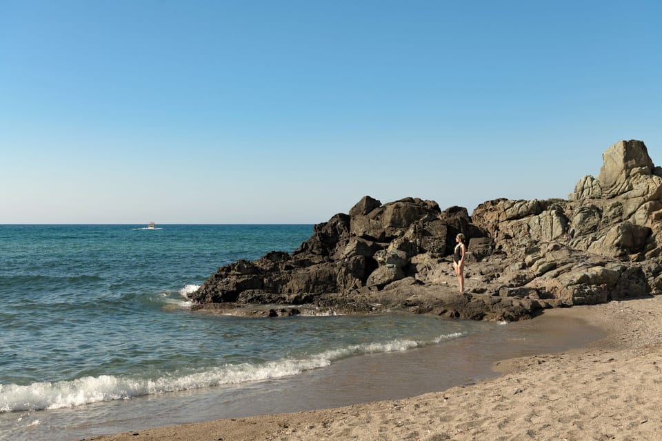 Morning beach walks and sunset village strolls come naturally here.
